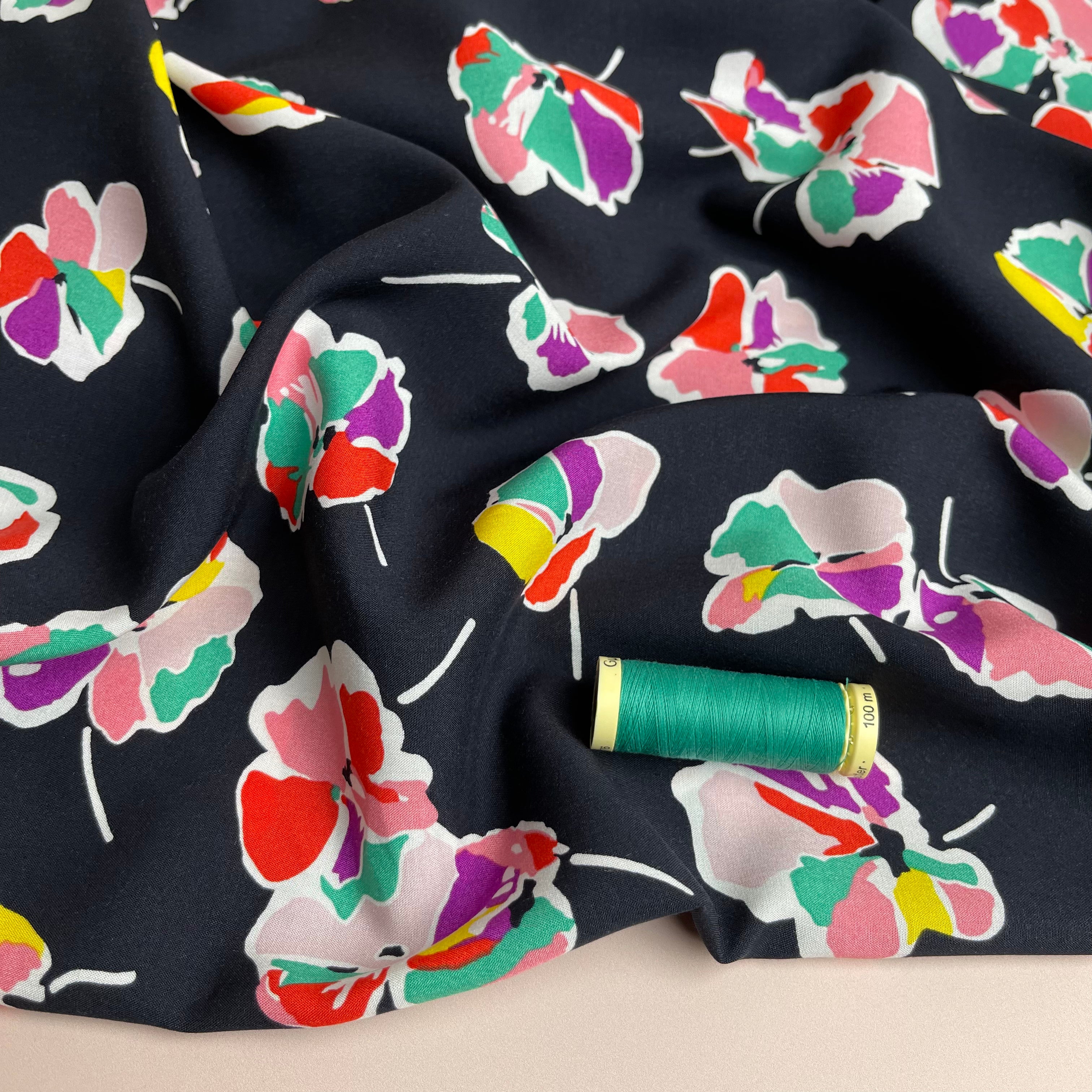 Rainbow Flowers on Black Viscose Fabric