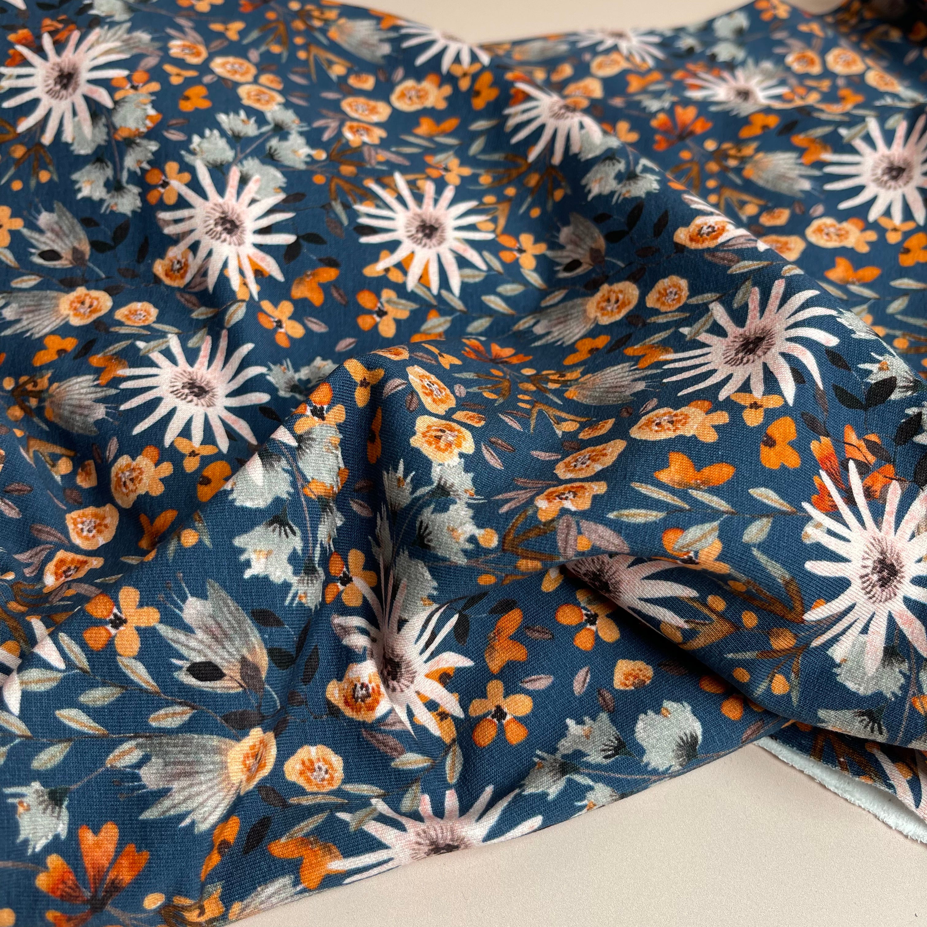 REMNANT 0.41 metre Garden Flowers in Petrol Blue Cotton Sweat-shirting Fabric