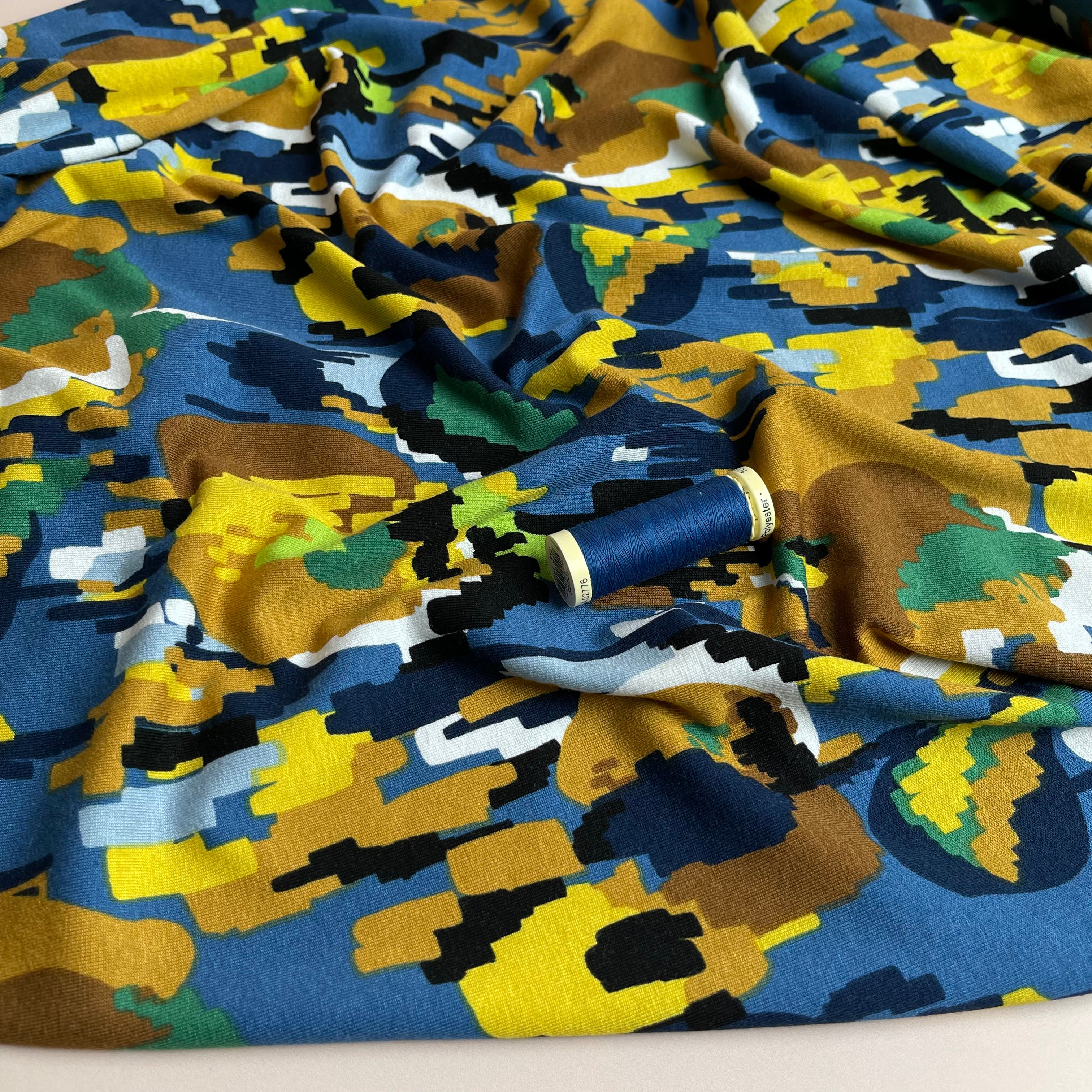 Pixel Flowers in Blue Viscose Jersey Fabric