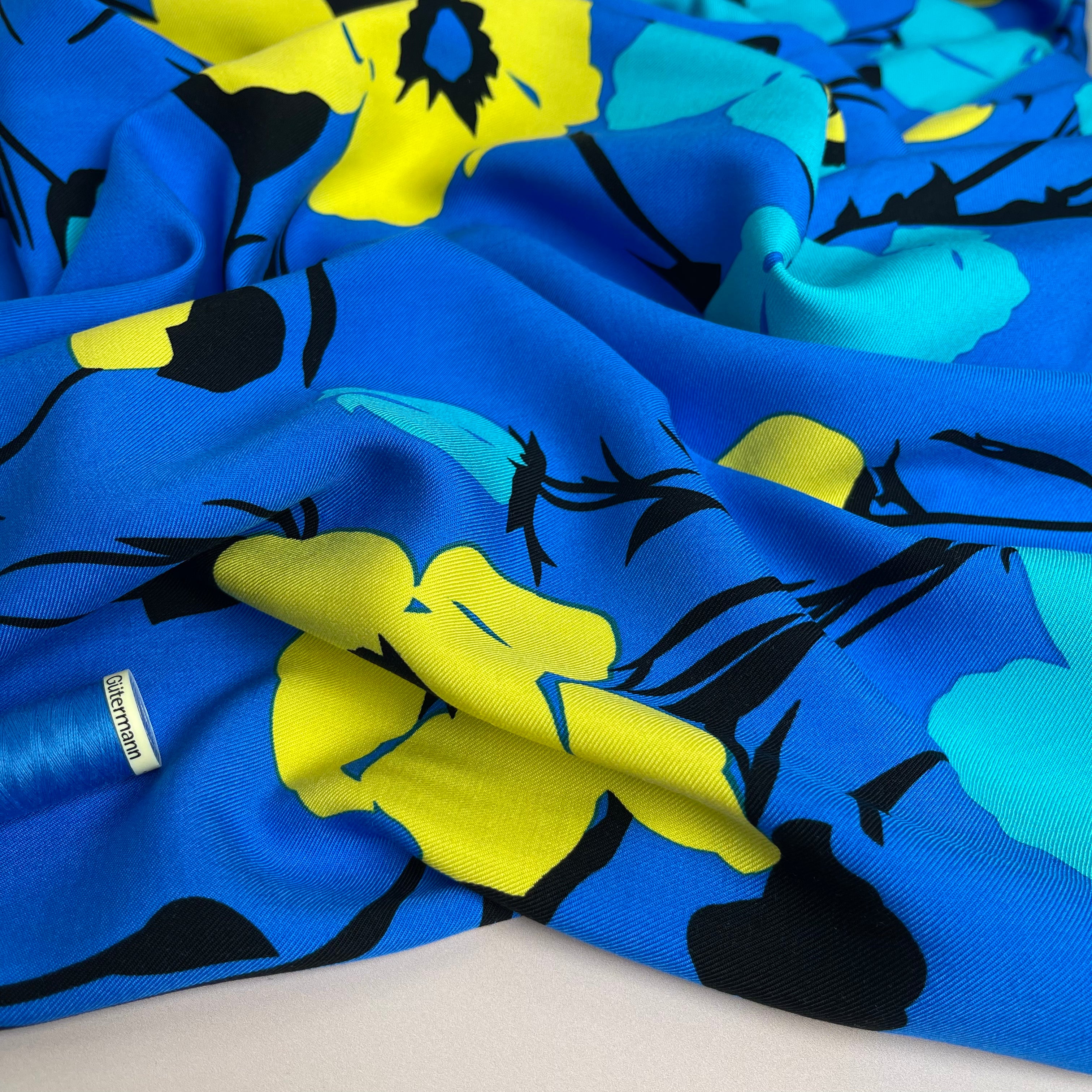 REMNANT 2.03 metres - FAULT apprx. 5cm pull in the centre - Bold Flowers in Brilliant Blue Viscose Twill Fabric