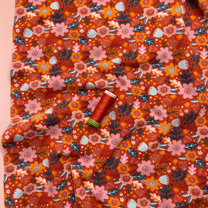 Flowers on Burnt Orange GOTS Organic Cotton Jersey Fabric