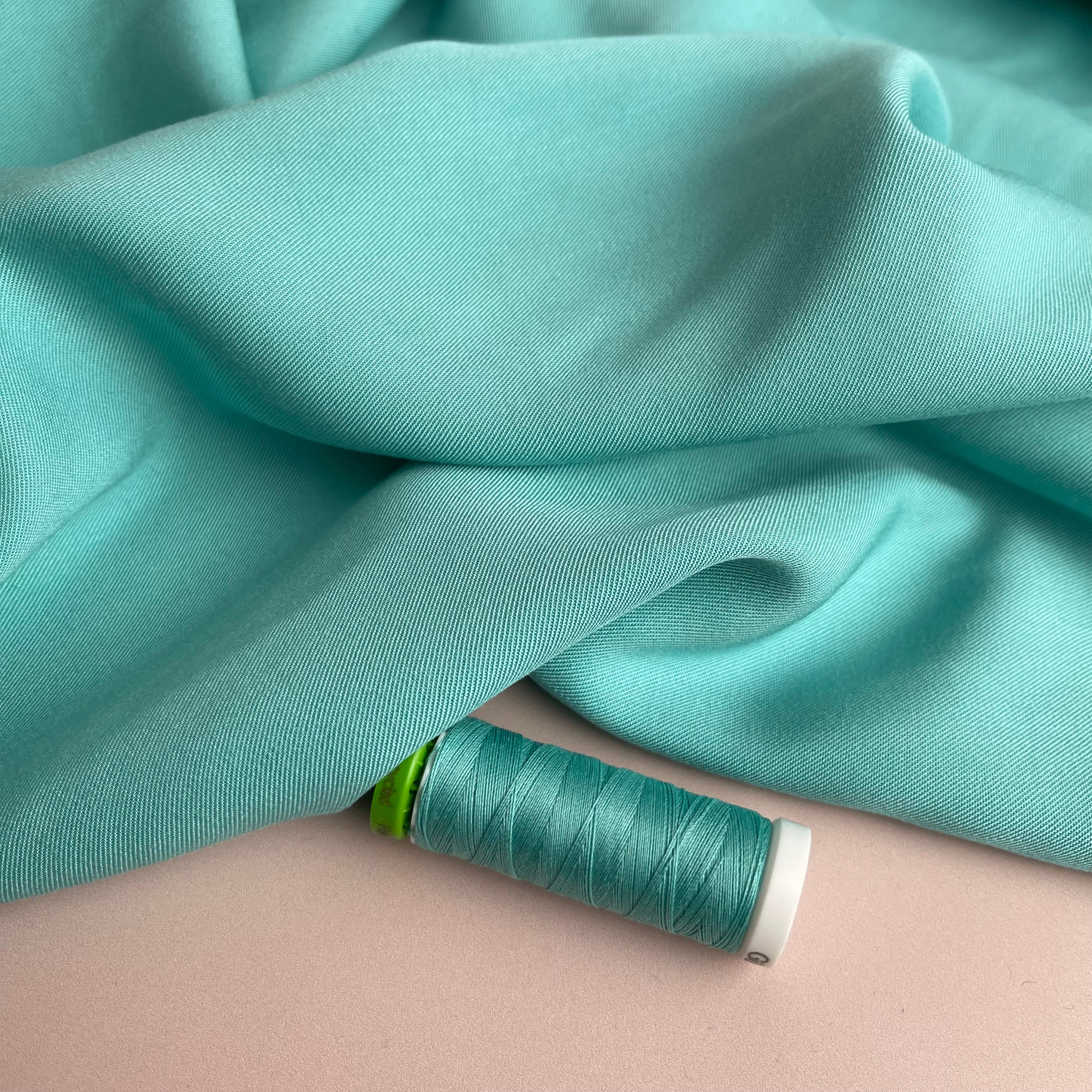Grandeur Aqua Blue Viscose Twill Dress Fabric – Lamazi Fabrics