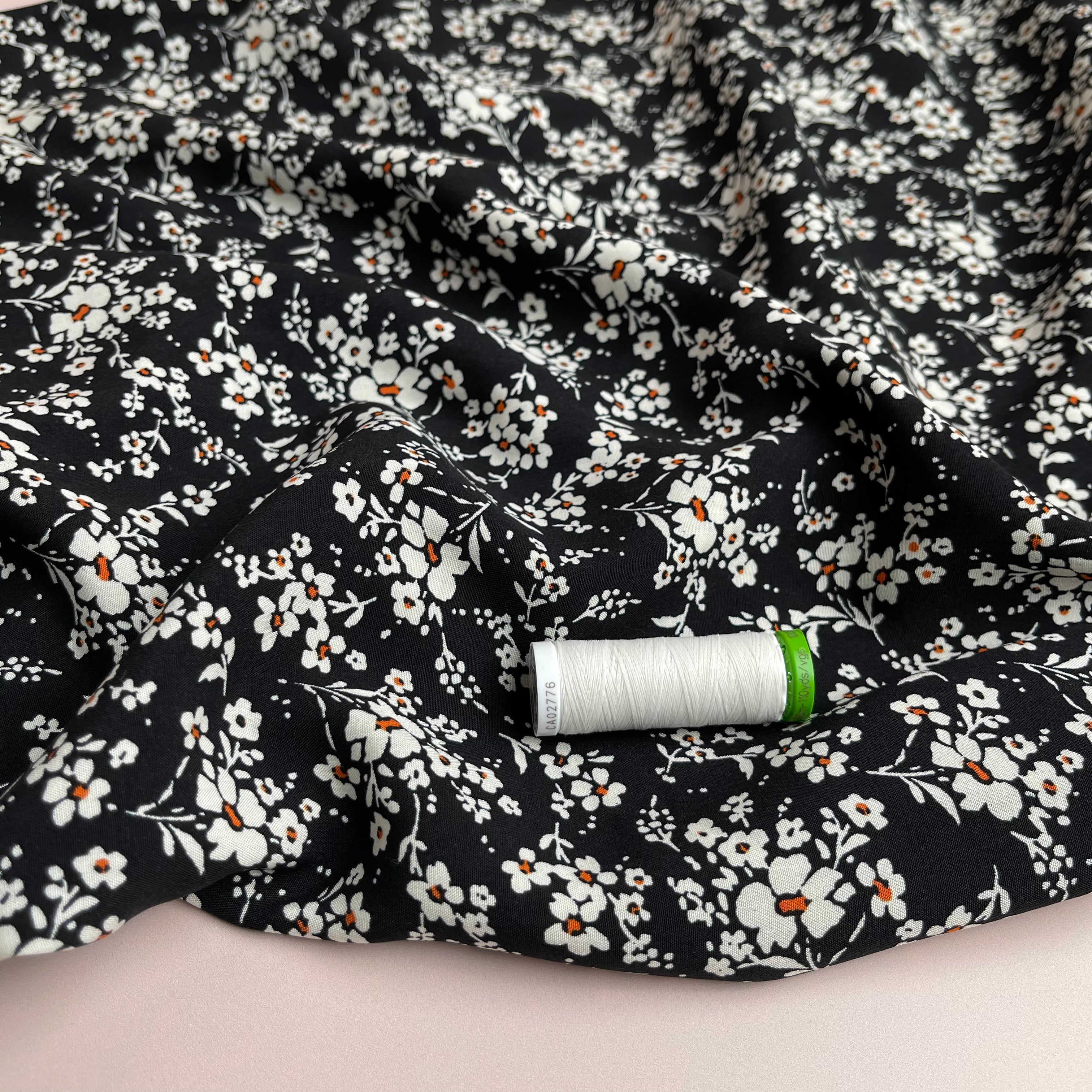 Ditsy Meadow on Black Viscose Fabric