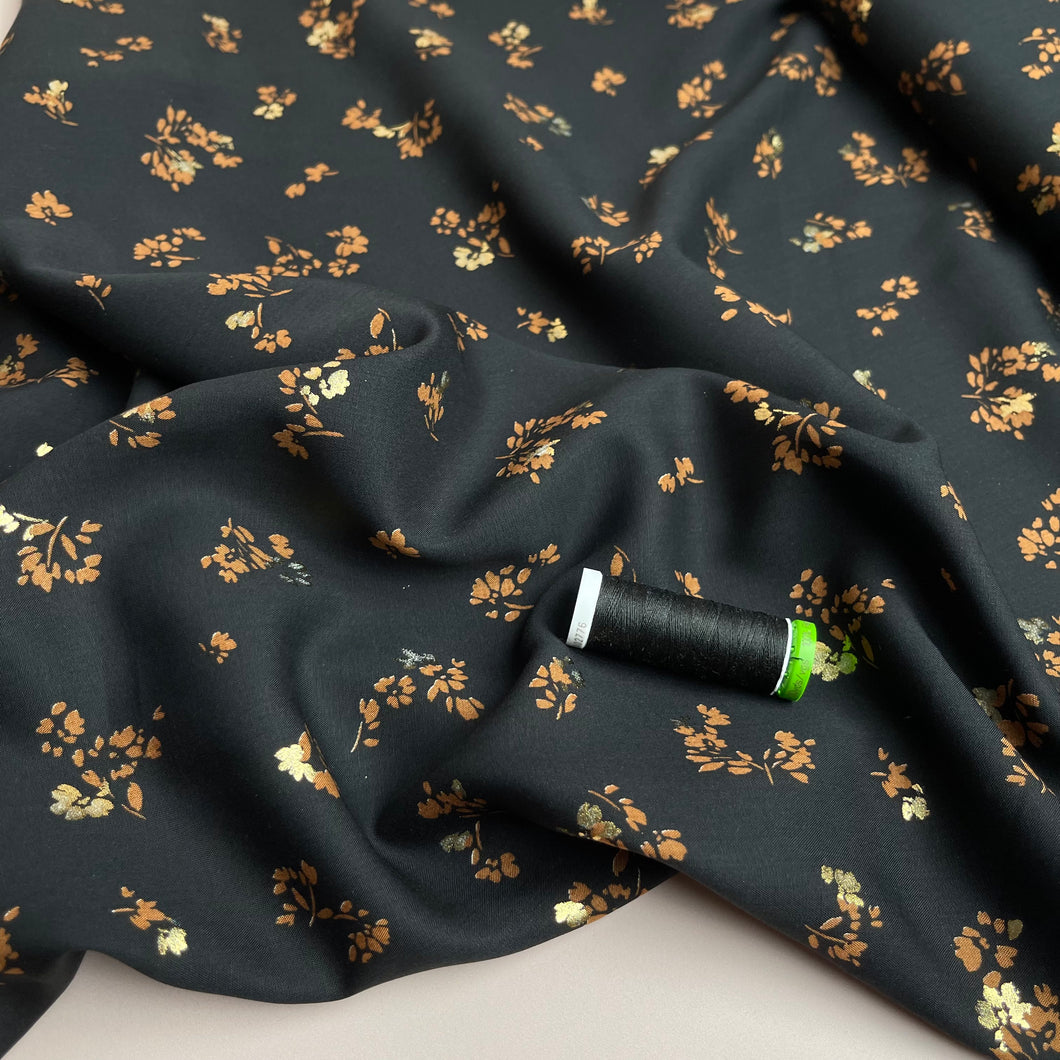 Sparkle Flowers on Black Viscose Fabric