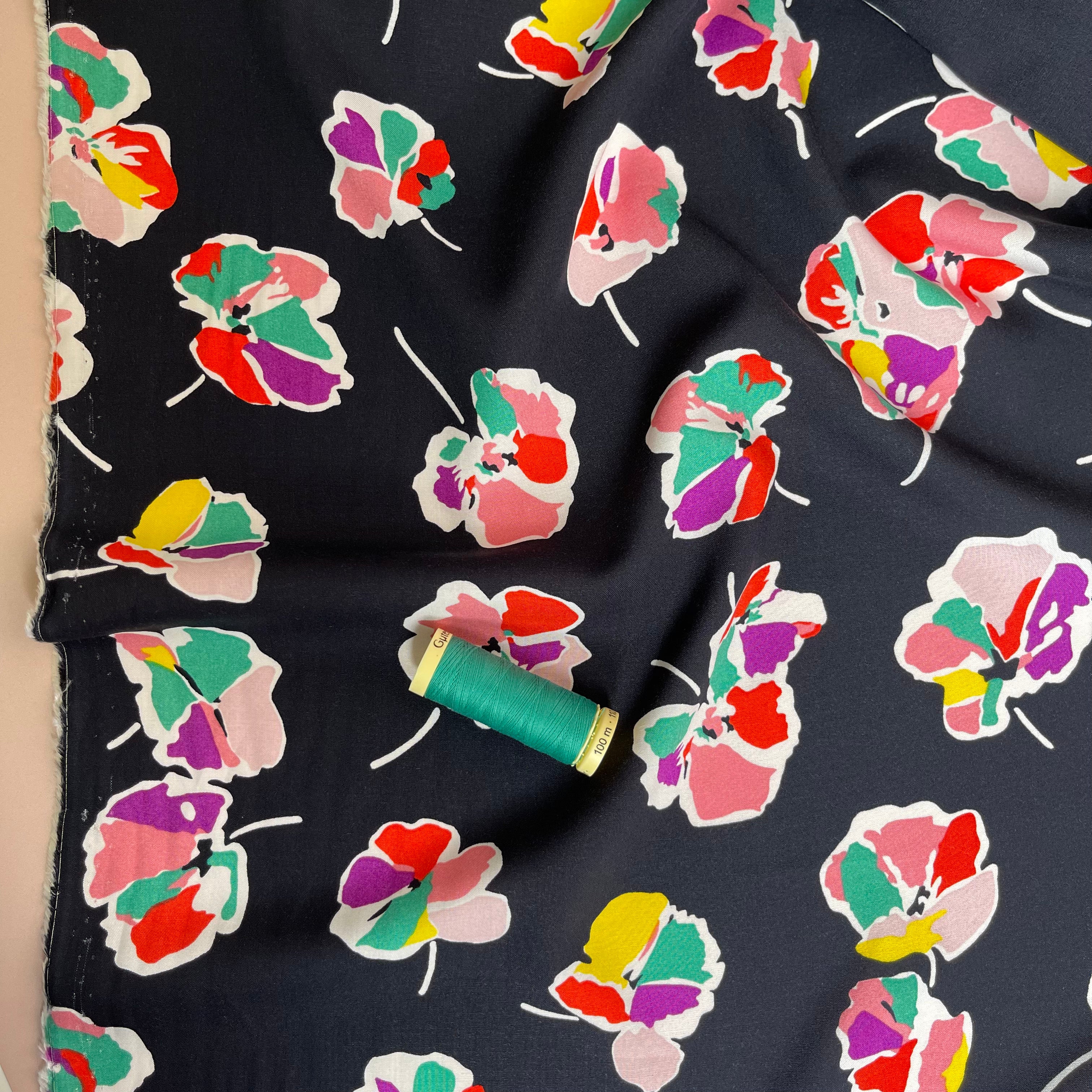 Rainbow Flowers on Black Viscose Fabric