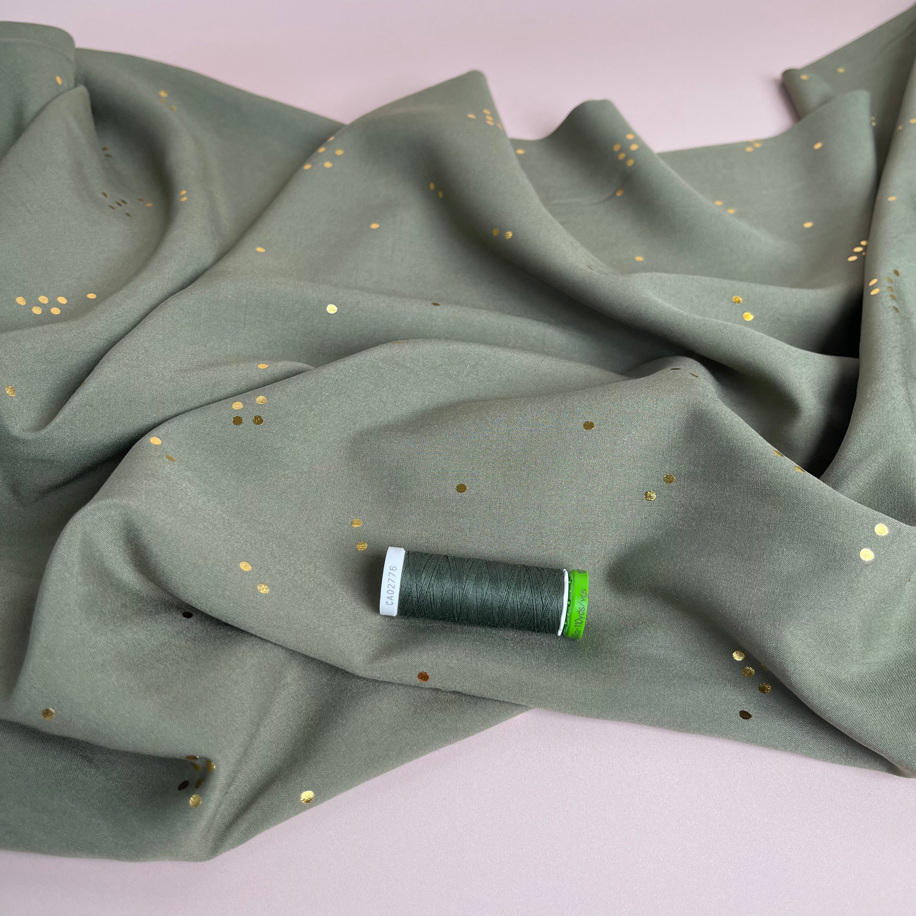 Sparkles in Olive Green Viscose Fabric