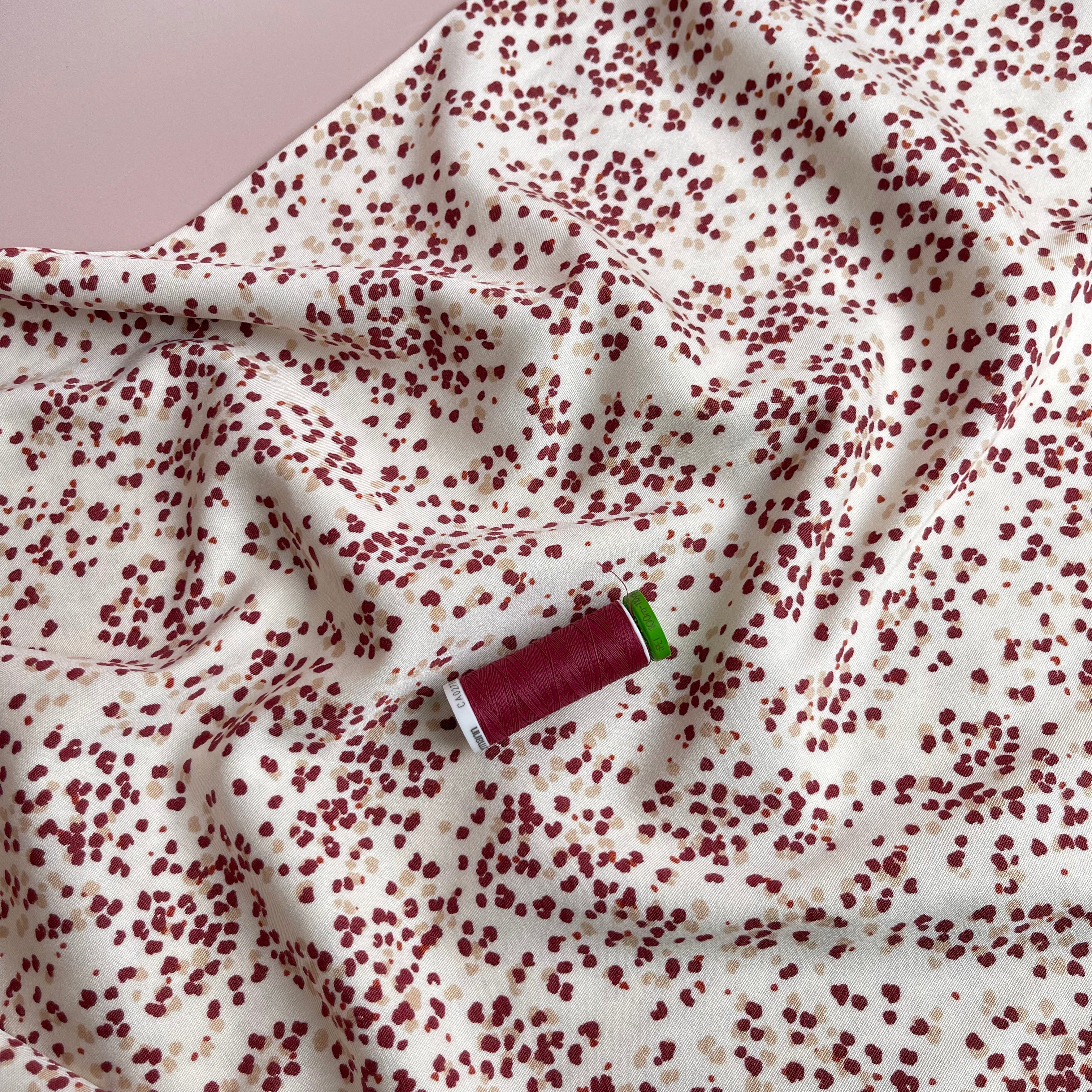 Rosella Speckles Off-White Stretch Viscose Twill Fabric