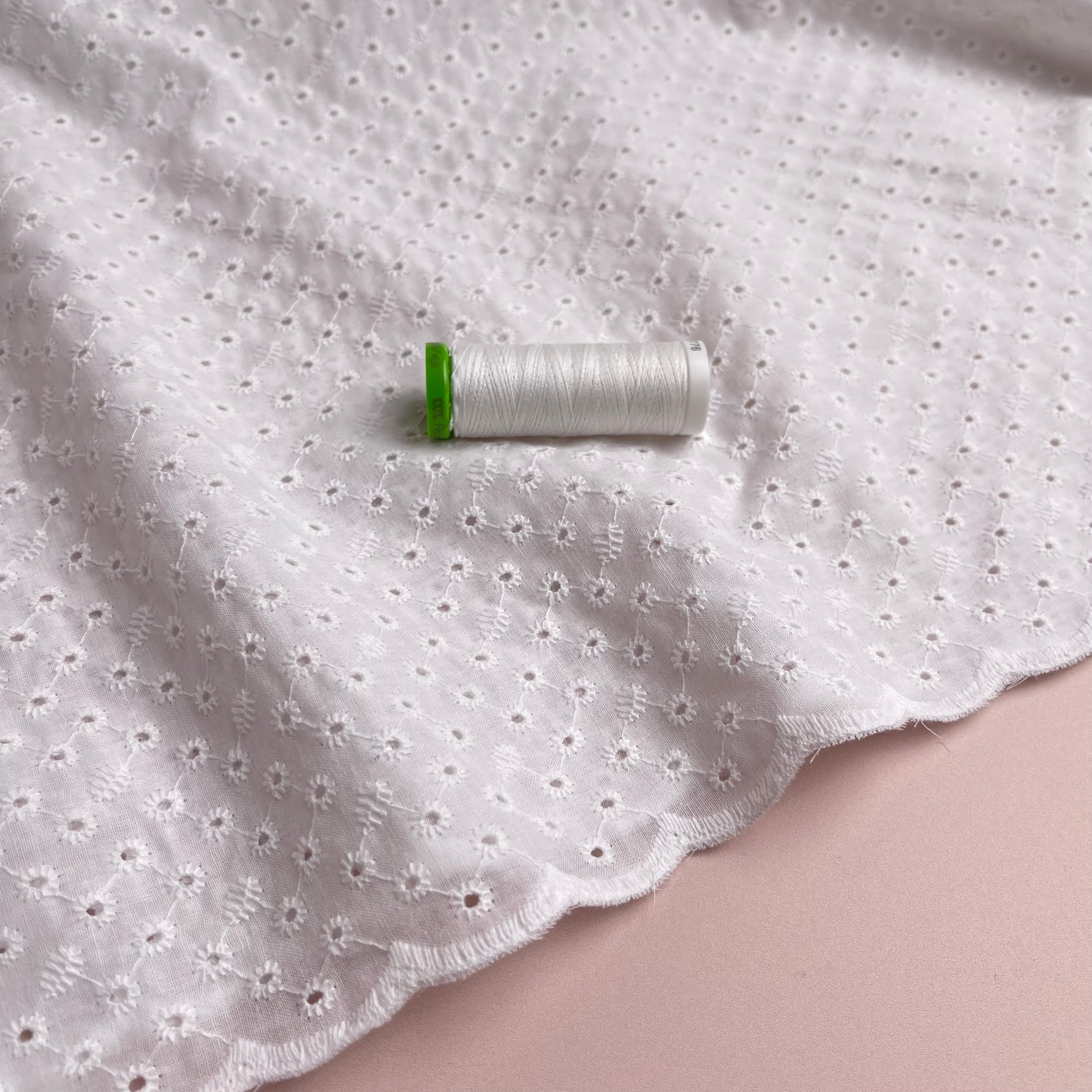 White eyelet discount lace fabric