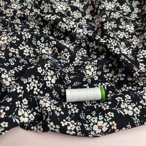 Ditsy Meadow on Black Viscose Fabric