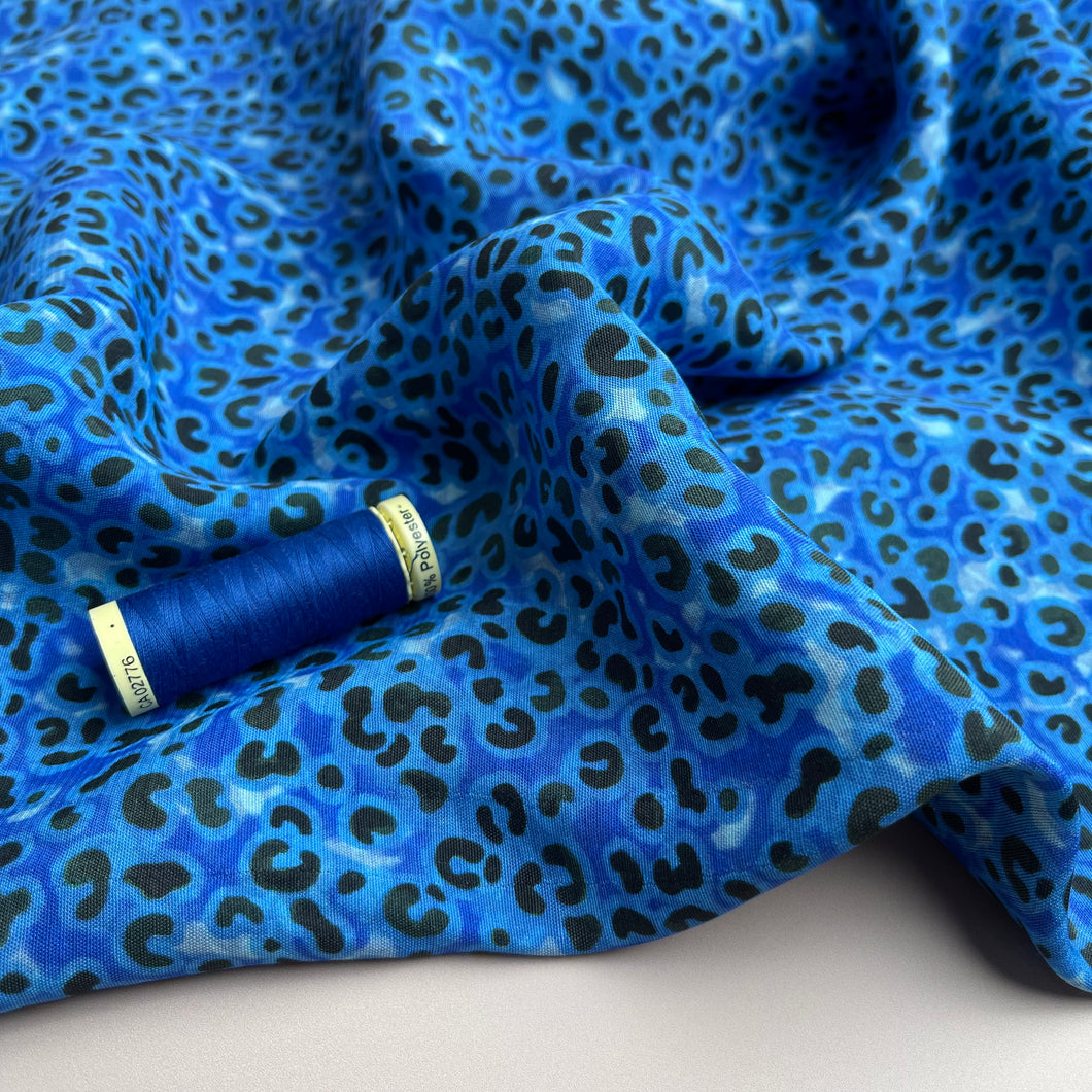Leopard Print in Cobalt Viscose Crepe with LENZING™ ECOVERO™ fibres.