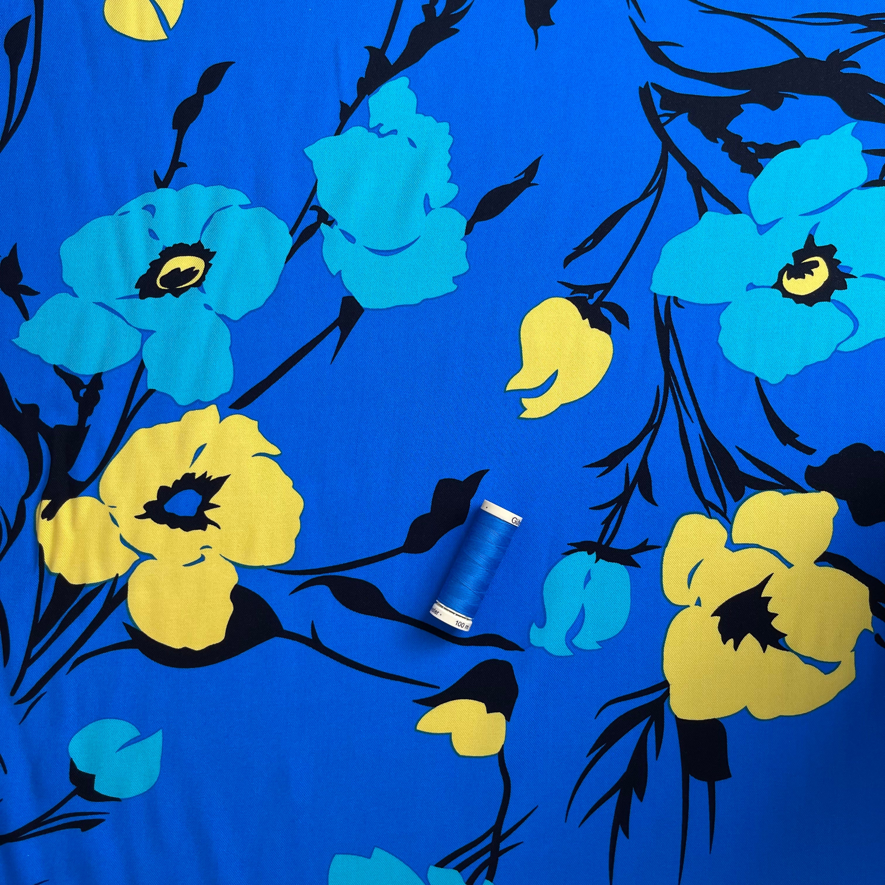 REMNANT 2.03 metres - FAULT apprx. 5cm pull in the centre - Bold Flowers in Brilliant Blue Viscose Twill Fabric